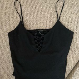 Black spaghetti strap lace up crop tank from Forever 21.